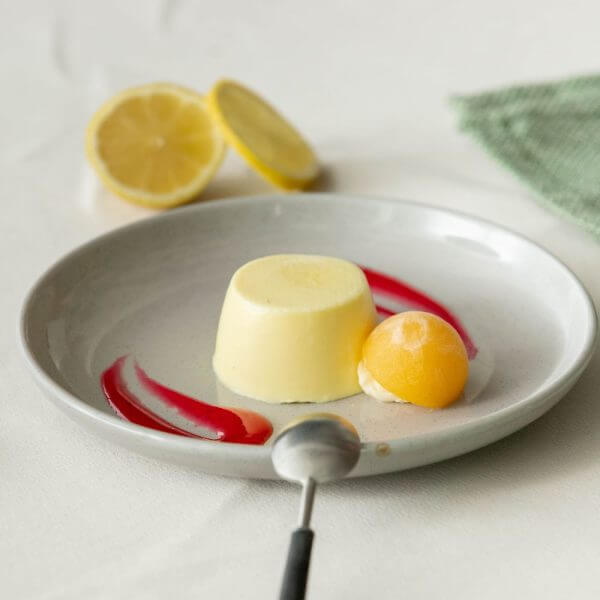 pureed lemon panna cotta on a plate