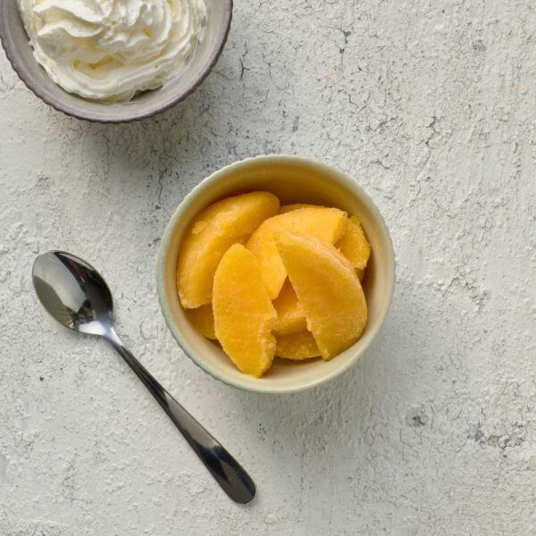 pureed peach slices in a bowl