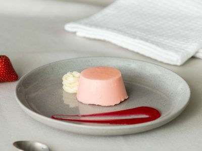 pureed strawberry panna cotta