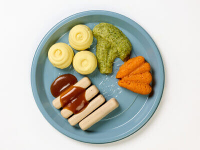 level 5 pork chipolatas and vegetables pre-plated meal