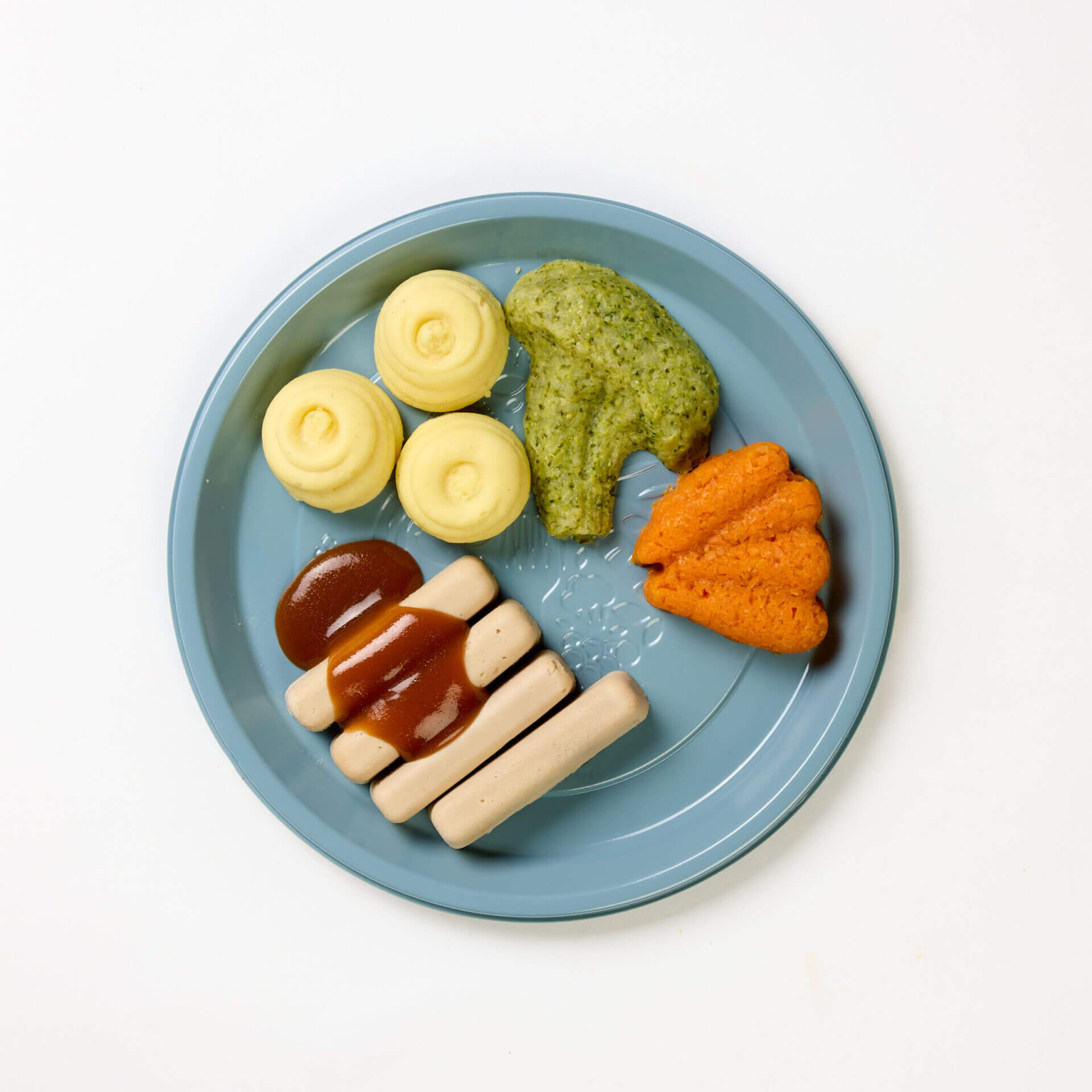 level 5 pork chipolatas and vegetables pre-plated meal